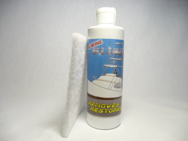 A bottle of cleaner and sponge for cleaning boats.